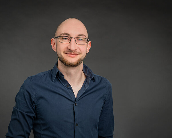 Justin Kromlinger Portraitfoto von Justin Kromlinger