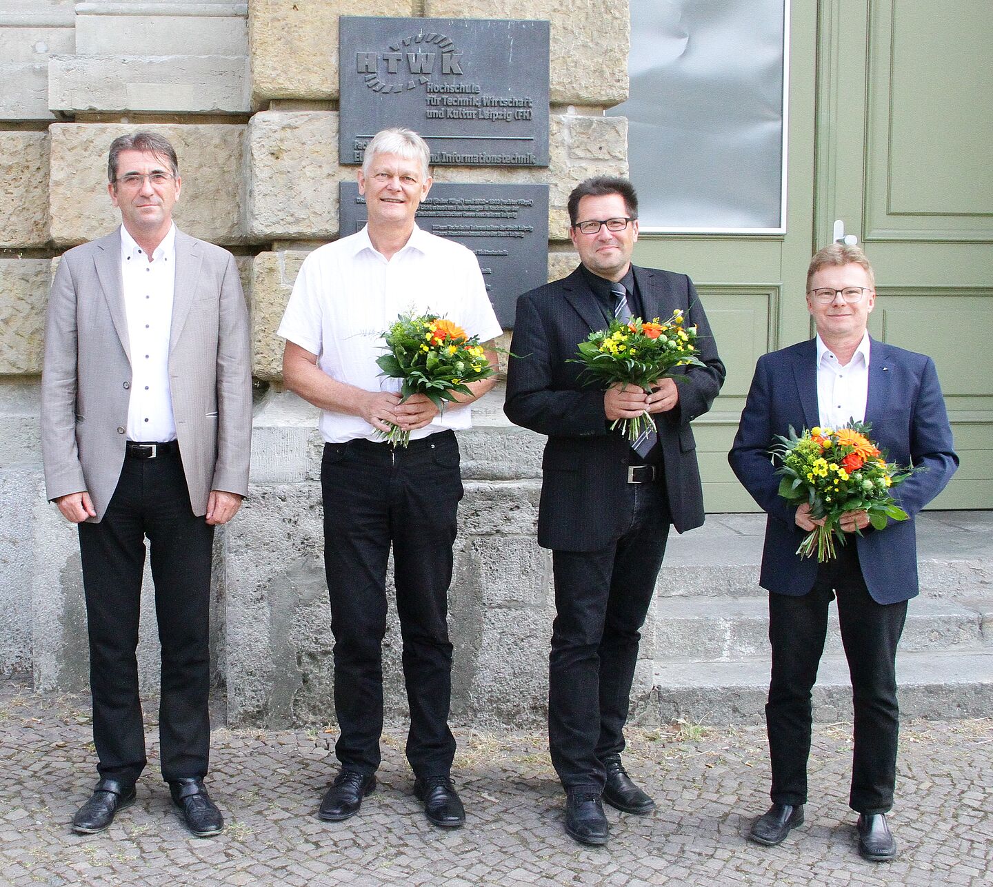 Prof. Volker Slowik (Vorsitzender des FTZ-Kuratoriums), Prof. Wolfgang Reinhold (bisheriger wissenschaftlicher Direktor), Dirk Lippik (geschäftsführender Direktor), Prof. Tilo Heimbold (neuer wissenschaftlicher Direktor)