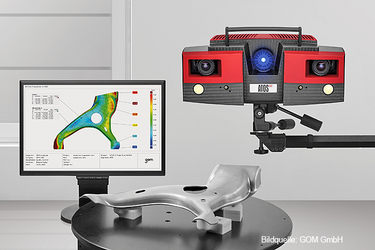 Reverse Engineering Scanner der GOM GmbH, daneben Monitor mit gescanntem Objekt