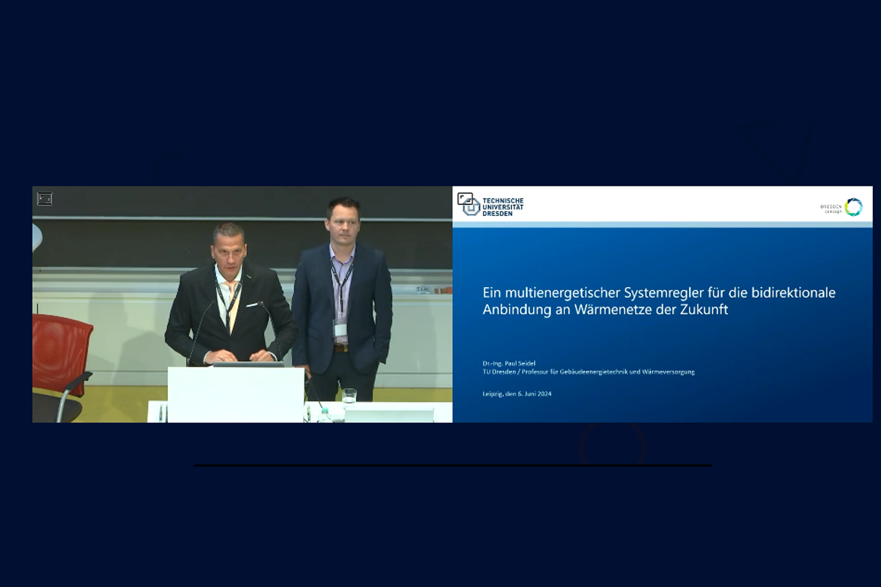 Foto von Präsentation im Hörsaal/Link führt zum Video